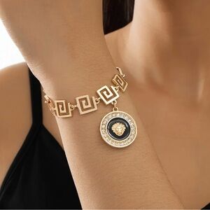 Elegant Gold Bracelet with Medallion